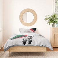 White comforter and pillow with “YOUR TEXT,” black-and-white figures, and red/green brush marks