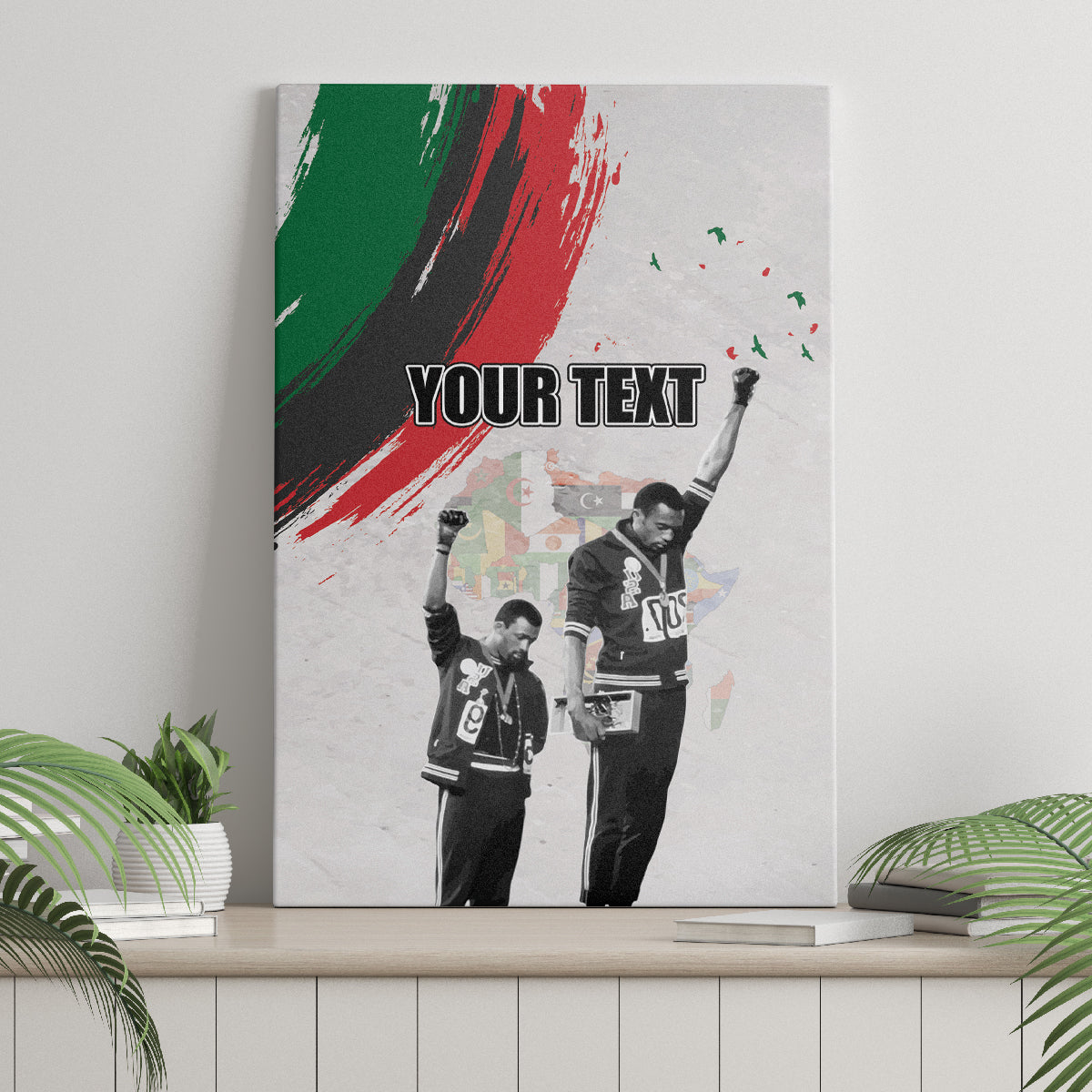 Personalized canvas wall art showing “YOUR TEXT” over two figures with raised fists and splatter