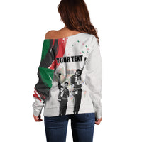 Women’s off-shoulder white sweater with back Juneteenth graphic and custom text