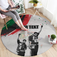 Round gray rug with 'YOUR TEXT' in black over vintage freedom-day salute image
