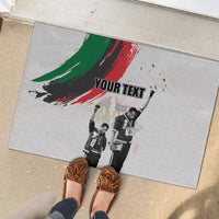 Gray rubber doormat with green-red brush salute graphic and 'YOUR TEXT' text