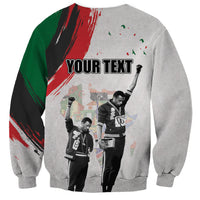 Heather gray personalized Juneteenth sweatshirt with 'YOUR TEXT' placeholder graphic
