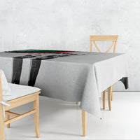 Personalized Juneteenth tablecloth, light gray with black-and-white figure graphic and green/red sweep