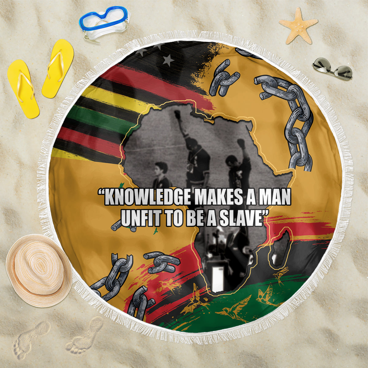 Round beach blanket, yellow with black/red/green graphic and white fringe edge
