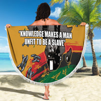 Round beach blanket held up, yellow graphic with slogan and chain illustrations