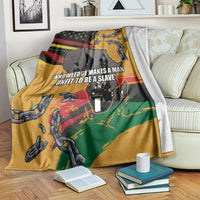 Juneteenth Freedom Day blanket draped on sofa, yellow with chains, map, and slogan