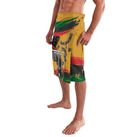 Men's printed wrap skirt, yellow with side red/green stripes and raised fist/chain art
