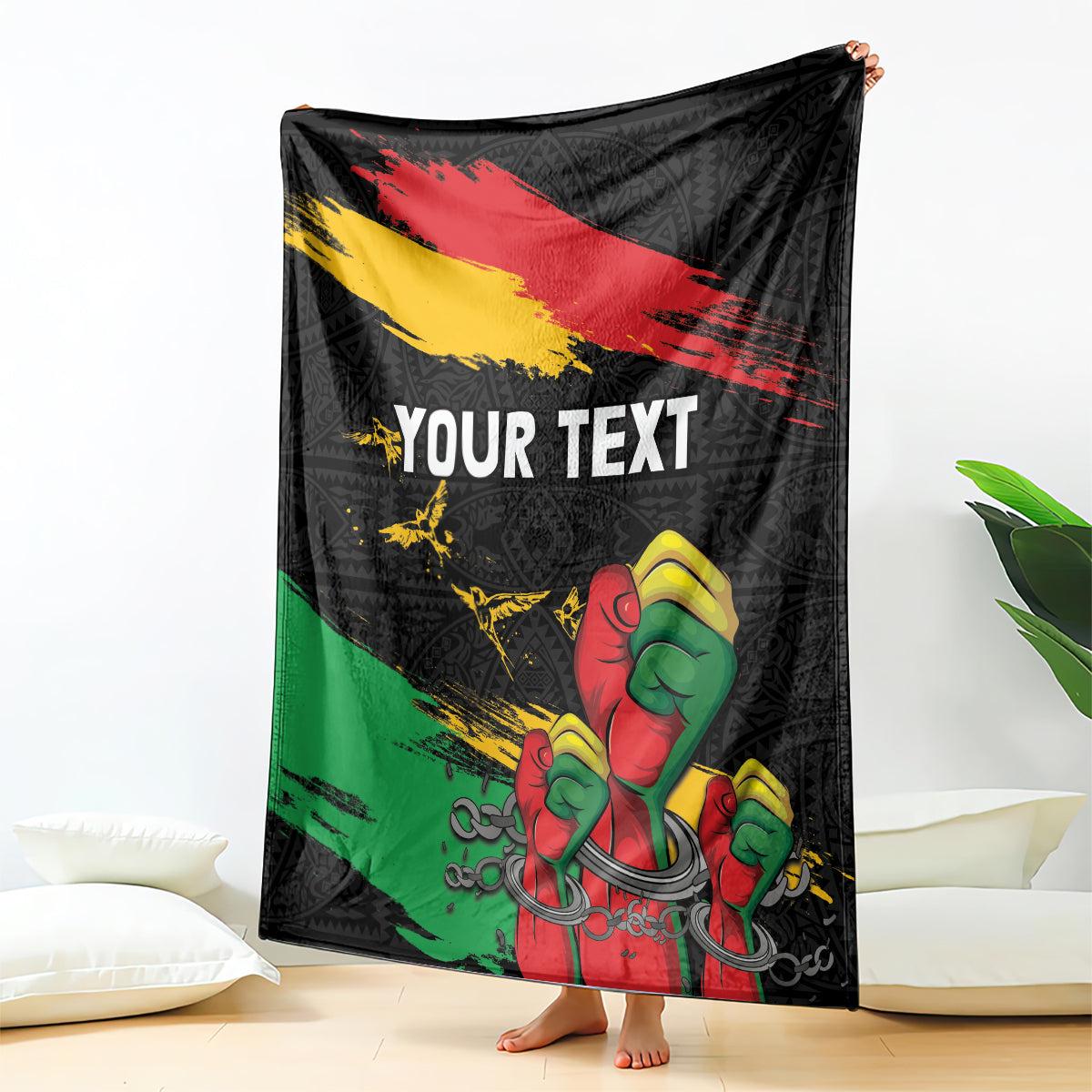 Black personalized blanket with 'YOUR TEXT' and raised-fist print, red-yellow-green diagonal stripes