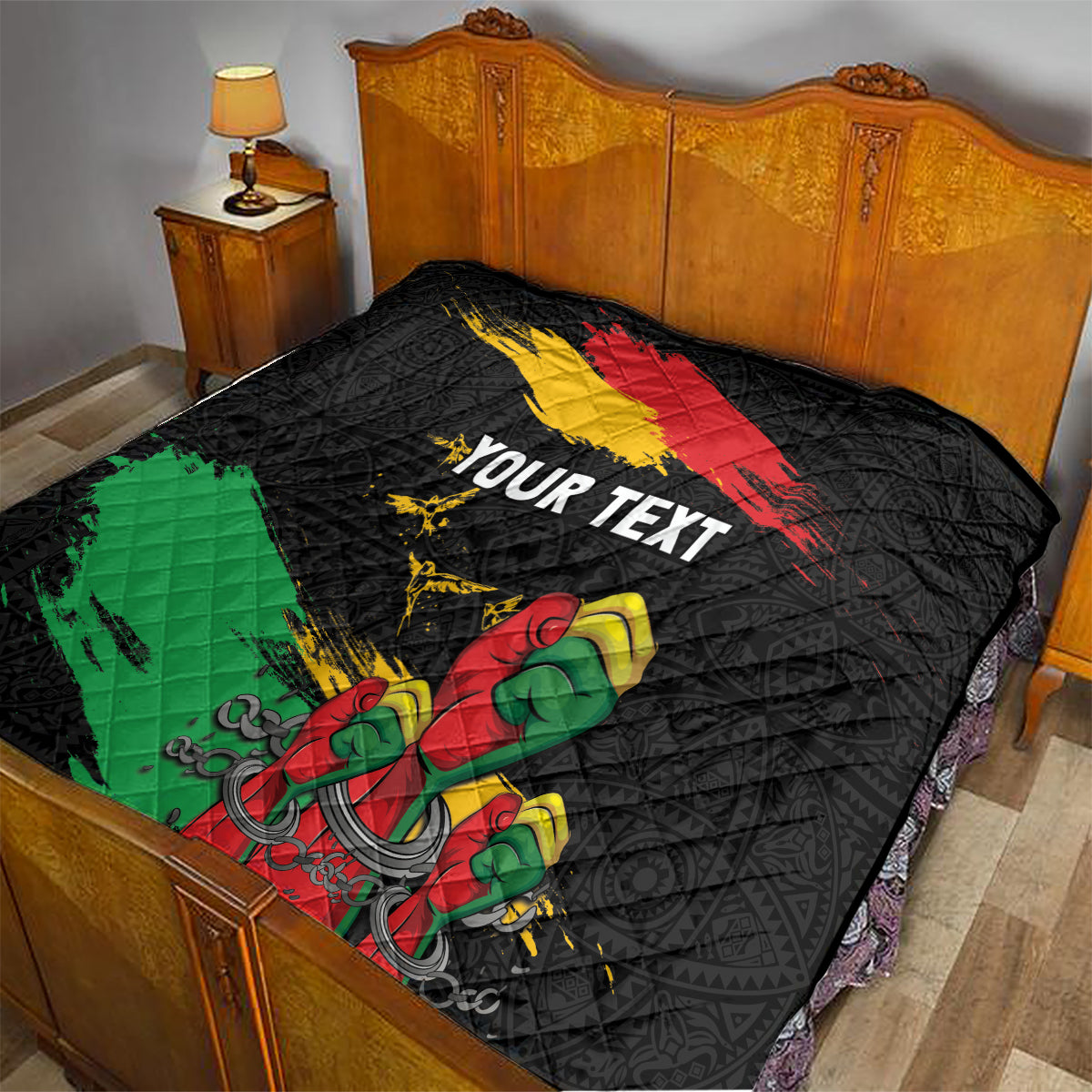Black quilt on a bed with red-yellow diagonal stripe, green band, raised fist, “YOUR TEXT”