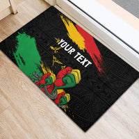 Personalized Juneteenth rubber doormat with black base, multicolor stripe, raised fist and “YOUR TEXT”