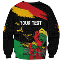 Unisex black sweatshirt with raised fist graphic, Africa pattern, and 'YOUR TEXT'