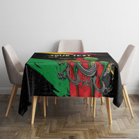 Black personalized tablecloth with raised fist design and 'YOUR TEXT' text at center.