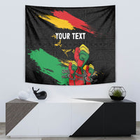 Black tapestry showing raised fist graphic with 'YOUR TEXT' across the middle