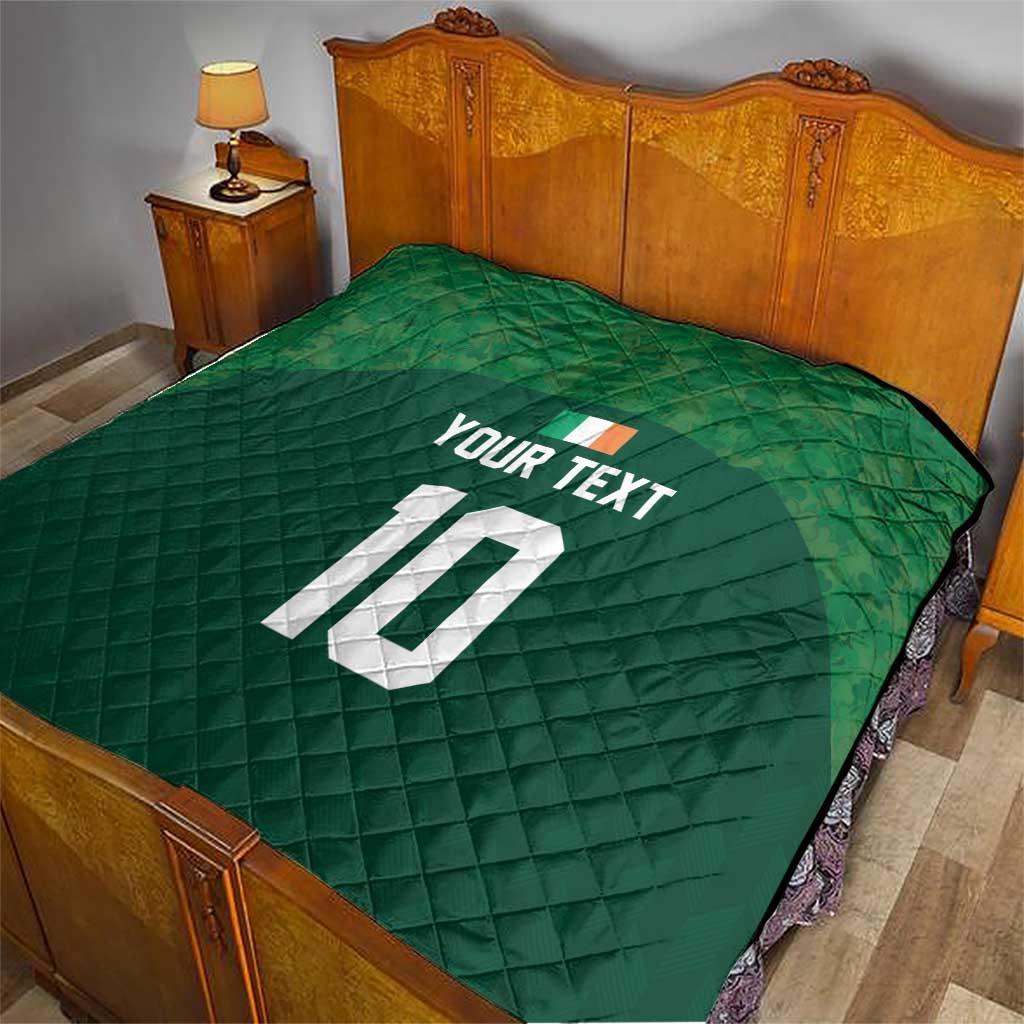 Green bed quilt with diamond stitching, custom text and number 10 in white