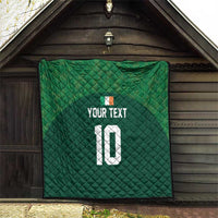 Green wall-hanging quilt with diamond quilting, custom text and number 10