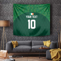 Green tapestry with custom text and large number 10 design, hanging on wall