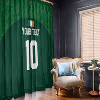 Green rugby-themed window curtain with custom text and white number 10, draped by room window