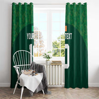Green rugby-themed window curtains with custom text and white number 10, view through open window