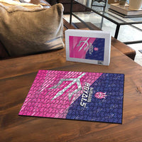 Barbados Royals jigsaw puzzle on wooden table with box, pink and blue design