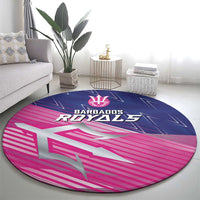 Round Barbados Royals cricket rug with trident symbol and pink striped graphic center