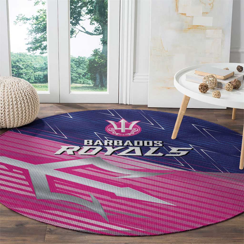 Round cricket carpet with Barbados Royals trident crest and bold pink, blue pattern
