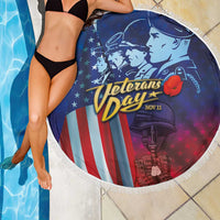 Round beach blanket with white fringe edge showing Veterans Day text and patriotic soldier