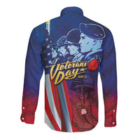 Blue long sleeve button shirt with Veterans Day back graphic, soldiers, flag stripes