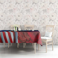 Patriotic tablecloth on table with red star background and blue-and-white vertical stripes