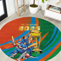 Round orange cricket-themed rug with blue-green rays, trophy players, 'THE CHAMPIONS 2025'