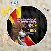Round black beach blanket with Uganda flag colors, crowned crane, and 09 Oct 1962 print