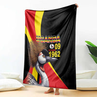 Black draped blanket with crowned crane art, Uganda flag stripes, and "UGANDA 09 1962"