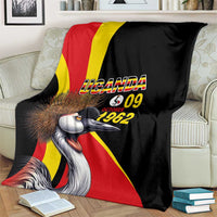 Black blanket with crowned crane and Uganda flag stripes; "UGANDA 09 1962" text
