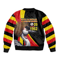 Black bomber jacket with Uganda flag stripes and crowned cranes back graphic