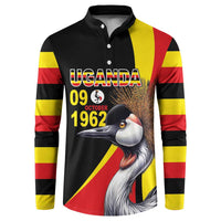 Black button-front sweatshirt with Uganda print, crowned crane graphic, and color block stripes