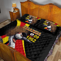 Black quilt bed set with crowned crane and Uganda 09 1962, shown on bed with two pillows