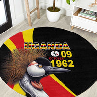 Black round carpet with Uganda text, crowned crane graphic and red-yellow flag stripes
