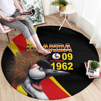 Black round carpet with Uganda and October 09 1962, crowned crane and flag stripes