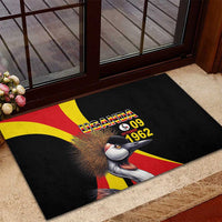 Black rubber doormat with crowned crane and Uganda flag design, “October 09 1962”