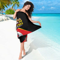 Black sarong with Uganda flag and crowned crane graphic, draped around waist