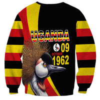 Unisex black sweatshirt with Uganda 09 Oct 1962 text, crowned crane artwork, striped sides