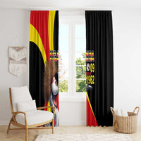 Black window curtains with Uganda flag artwork, crowned crane, and “09 October 1962”