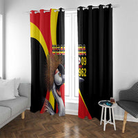 Black window curtain panels with red and yellow Uganda flag stripes and crowned crane