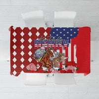 Red tablecloth with diamond pattern and US flag horse racing graphic