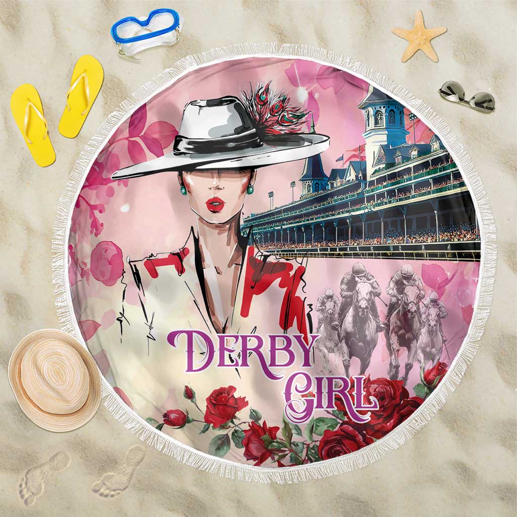 Pink round beach blanket with fringe edge, 'DERBY GIRL' portrait illustration and roses.