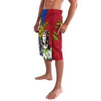 Men’s red patchwork lavalava shorts with face graphic, gold sun, and floral accents