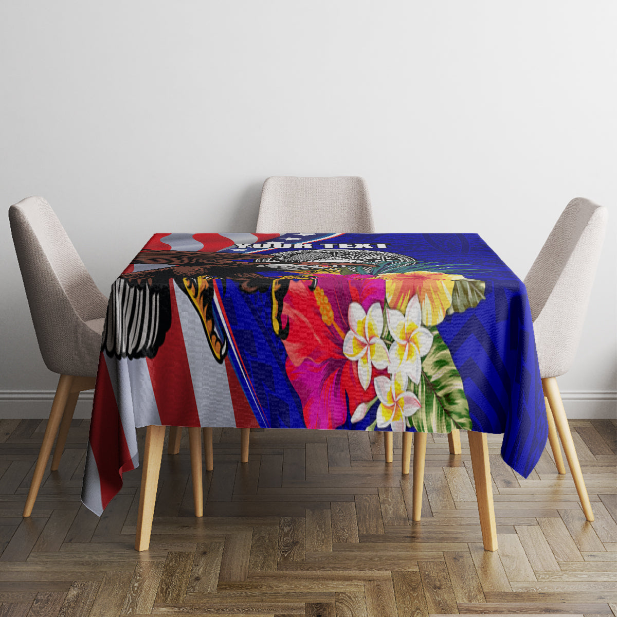 Blue printed tablecloth with hibiscus blooms and bold geometric shapes on wooden dining table