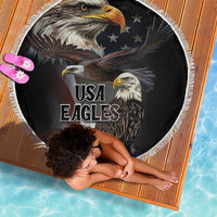 Round black beach blanket with white fringe and USA Eagles text, eagle faces design.