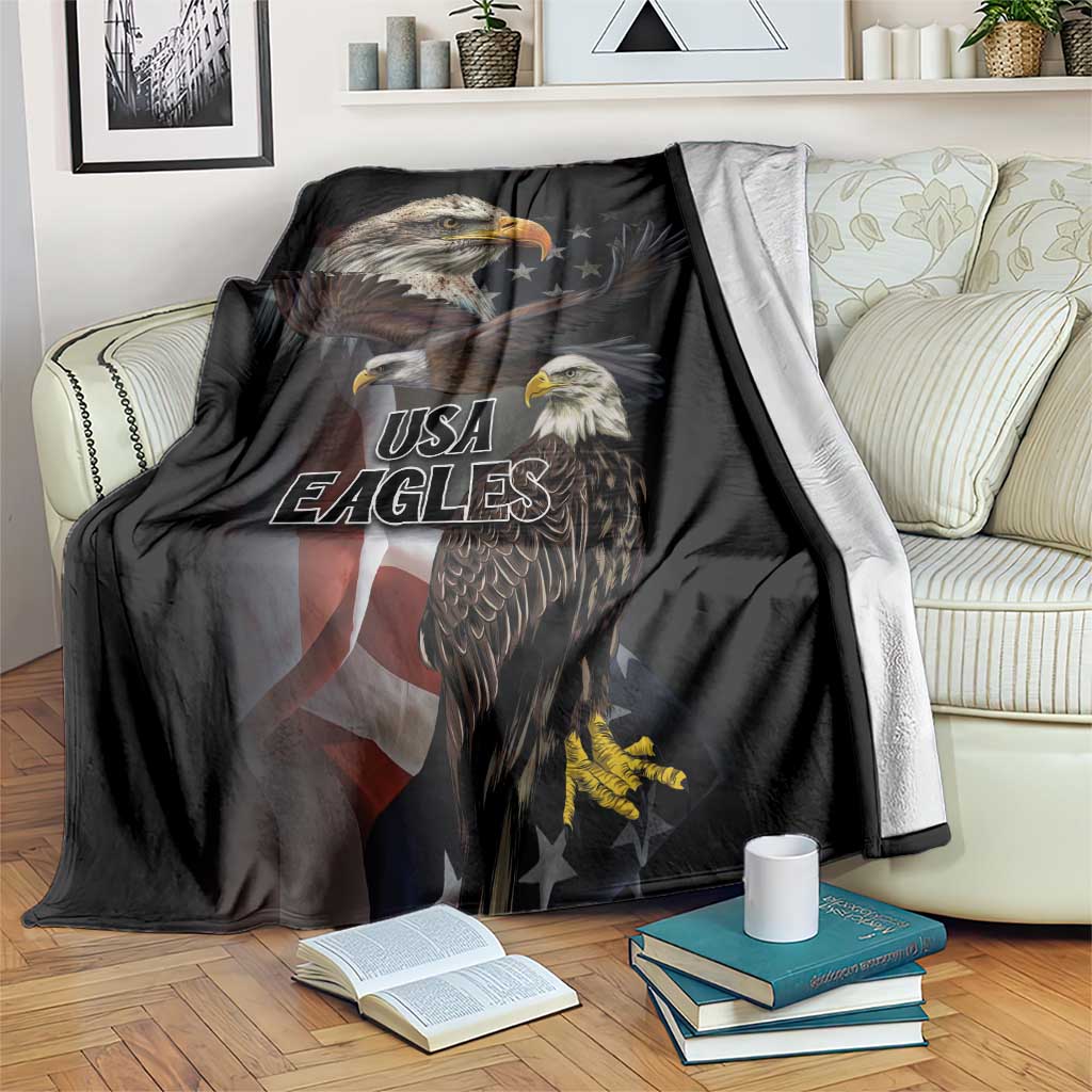 Black eagle blanket covering couch, USA Eagles graphic with stars and flag colors