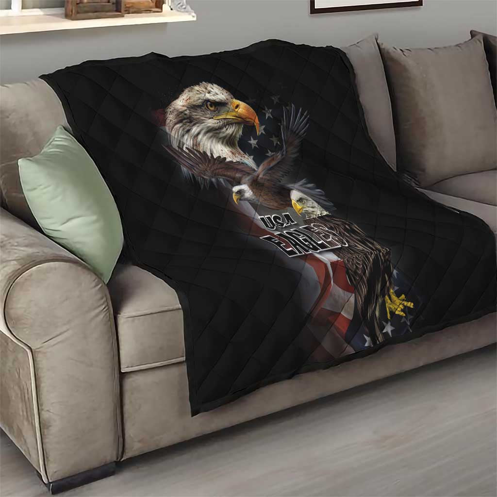 Black quilt blanket draped on a sofa, featuring eagles graphic and USA Eagles text