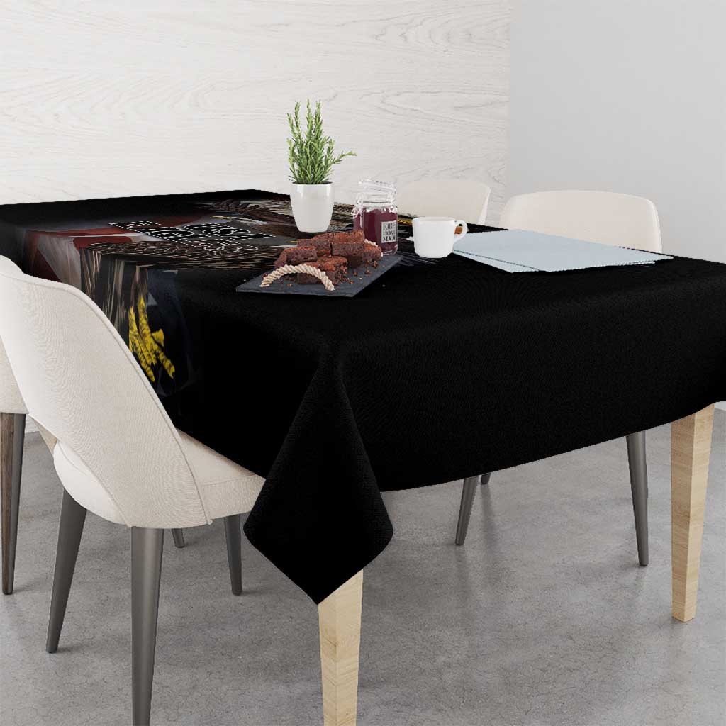 Black rectangular tablecloth featuring vintage eagle and star motif across the tabletop.